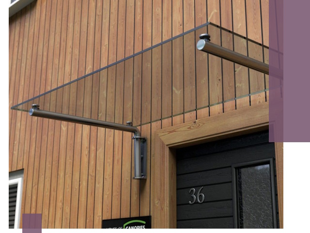 Стеклянные козырьки на входы и фасады в Зиме